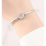 Ezüst merev charm karkötő, cirkóniákkal díszített mancs motívummal