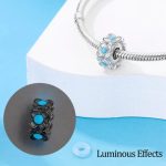 Világító ezüst stopper charm - türkizkék betétekkel